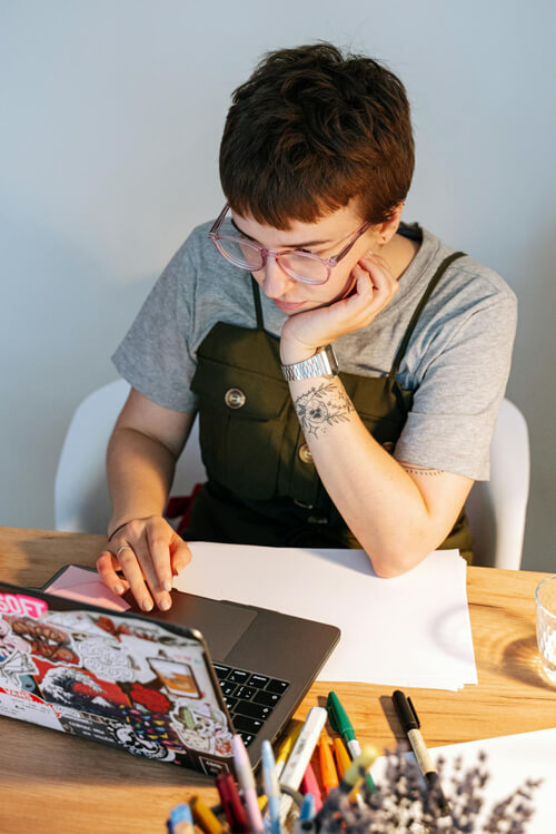 Web designer working on laptop